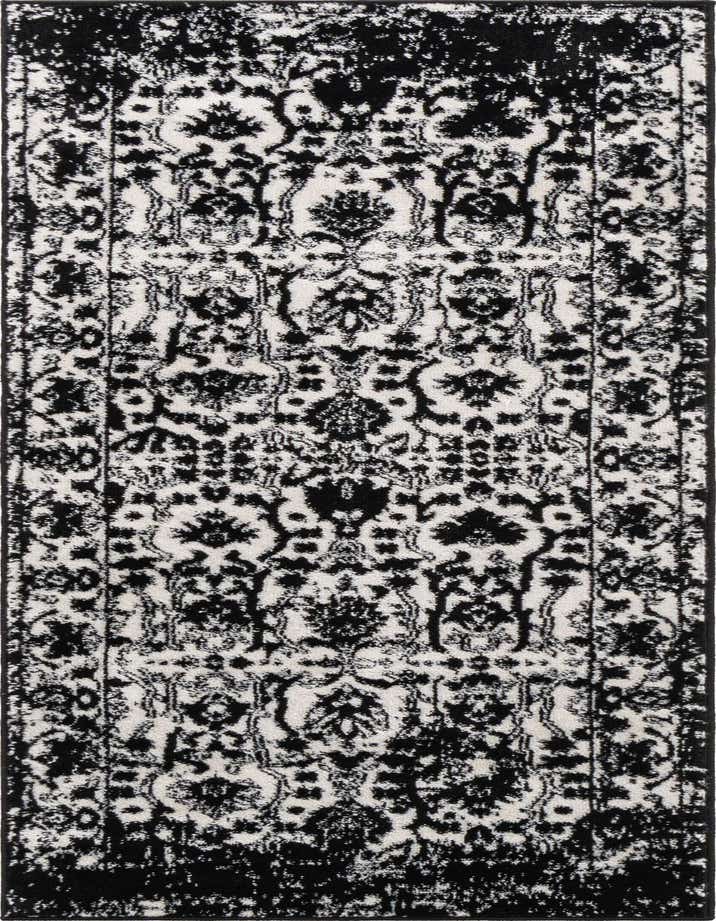 A black and white Oregon Collection runner rug with a distressed traditional floral pattern, ideal for a hallway.