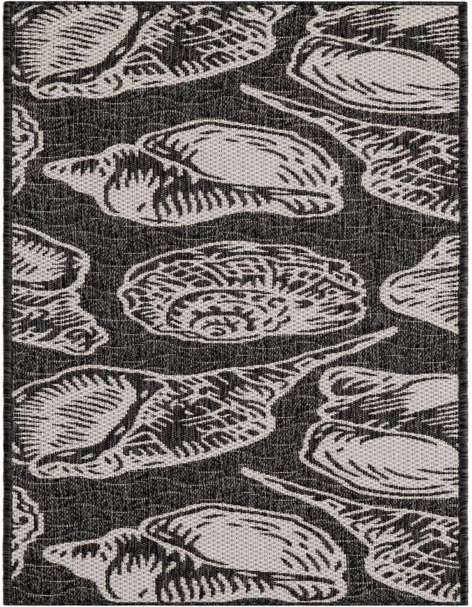 A 6 ft runner rug with a black background and large white seashell patterns, suitable for a hallway or patio.