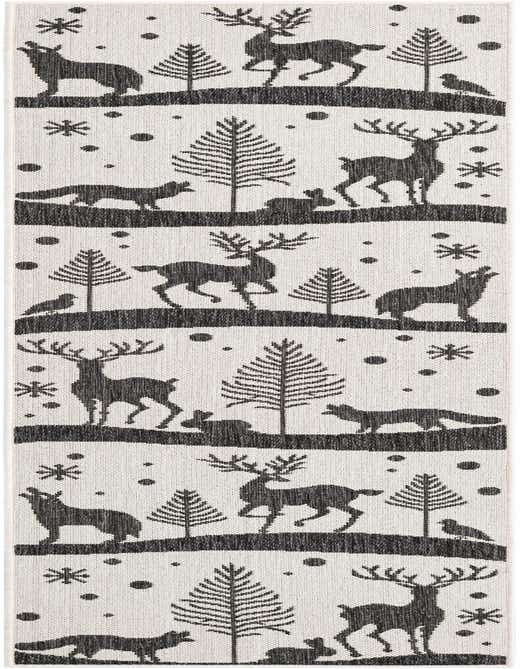 An 8 ft runner rug with a black and white modern winter scene featuring deer, foxes, rabbits, birds, and pine trees.