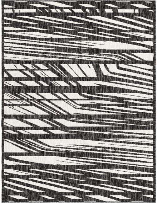 A black and white 8 ft runner rug with a modern abstract stripe pattern, suitable for a hallway or patio.