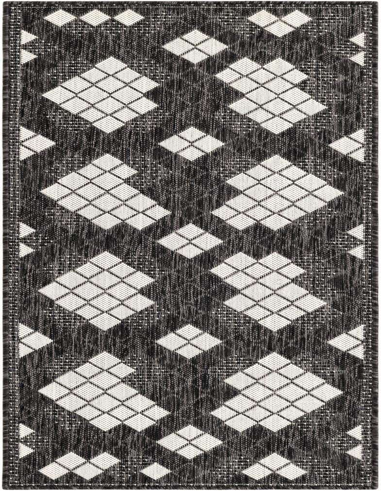 A black and white modern runner rug with a repeating geometric diamond pattern, ideal for a hallway or patio.