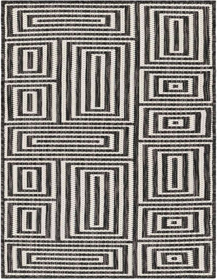 A 6 ft runner rug with a modern black and white abstract geometric pattern, ideal for a hallway or kitchen.