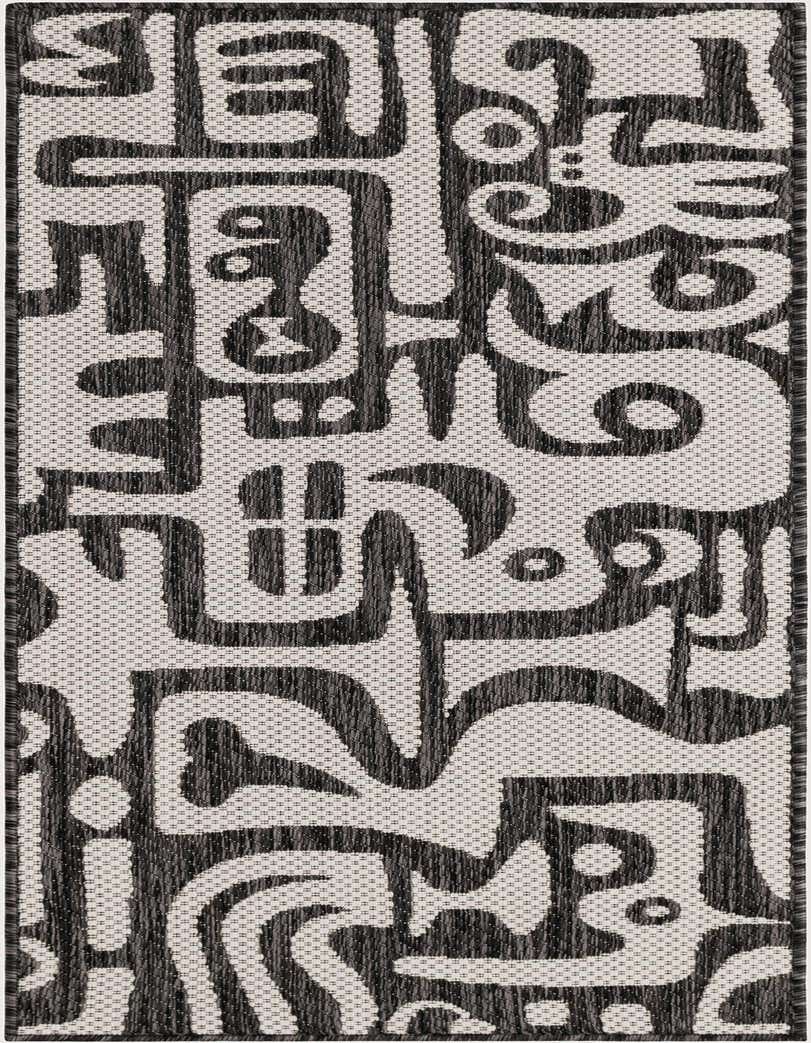 A 5 ft runner rug featuring a bold, abstract pattern in black and off-white, suitable for a hallway or patio.