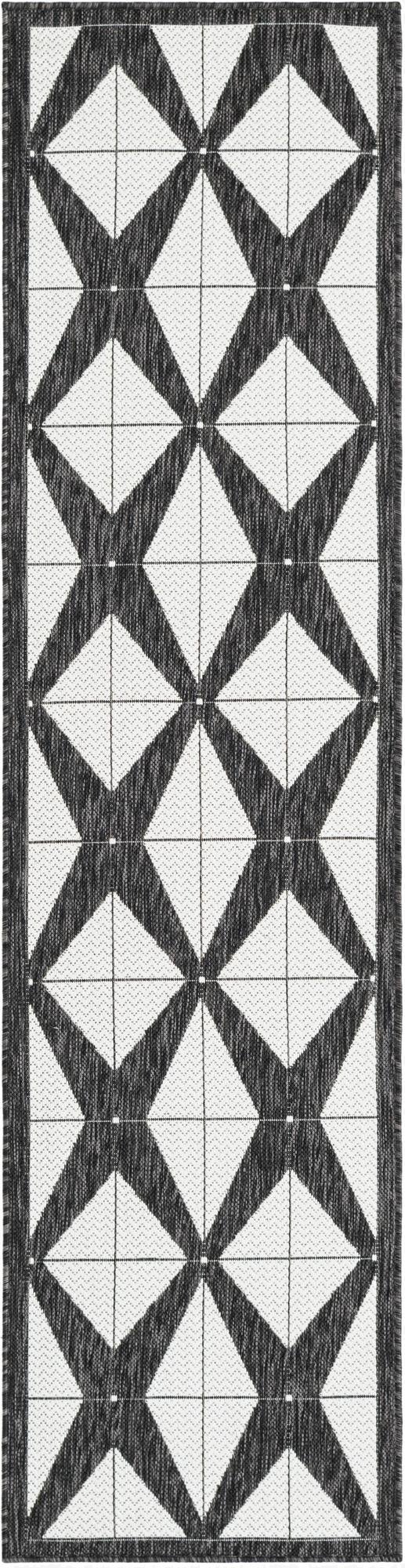 A black and white 8 ft runner rug with a bold modern geometric diamond pattern, suitable for a hallway or patio.