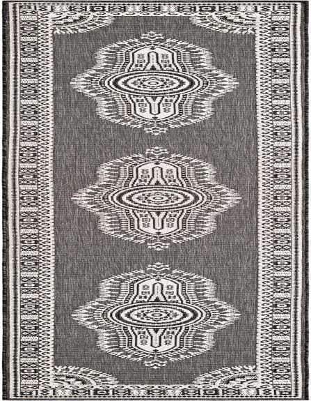 A 12 ft black and white runner rug with a traditional medallion pattern, suitable for a hallway or patio.