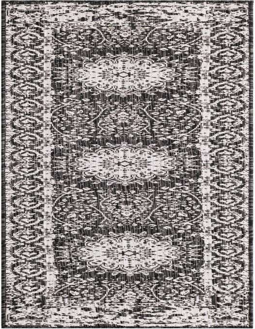 A black and white 8 ft runner rug with a distressed traditional medallion pattern, ideal for hallways or patios.