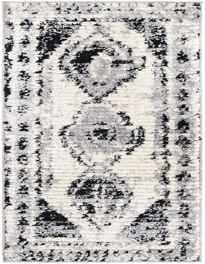 A 5 ft runner rug from the Tagine collection, featuring a textured black and white Southwestern pattern.