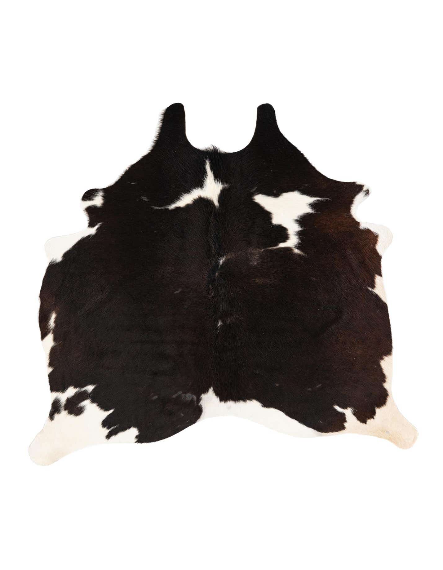 A 5' 0 x 5' 2 square black and white cowhide rug with natural, irregular markings, suitable for a modern living space.