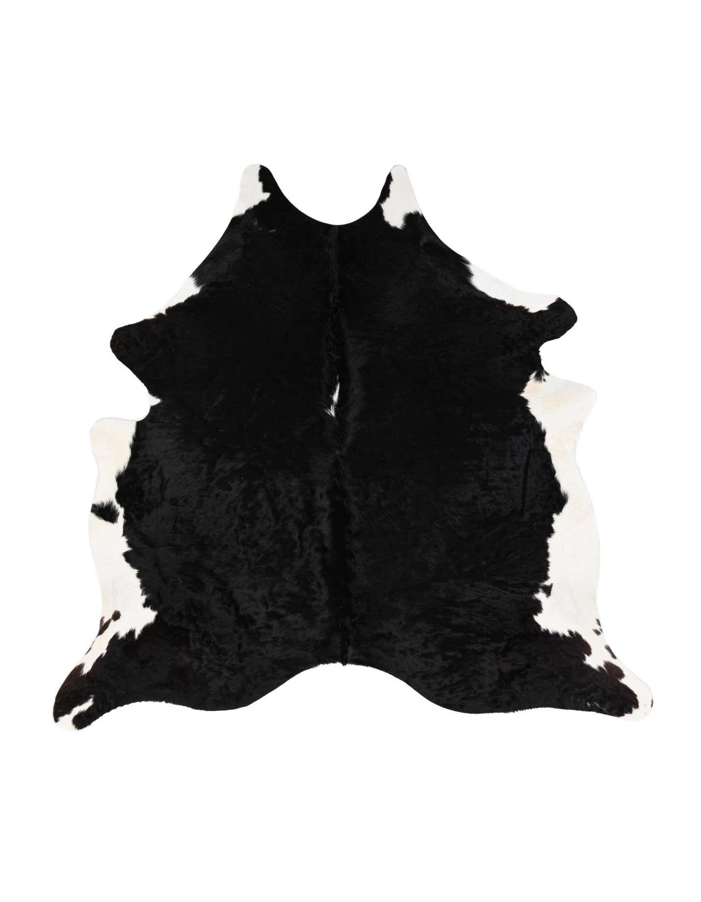 A black and white cowhide leather rug with an irregular, organic shape, showcasing its natural texture.