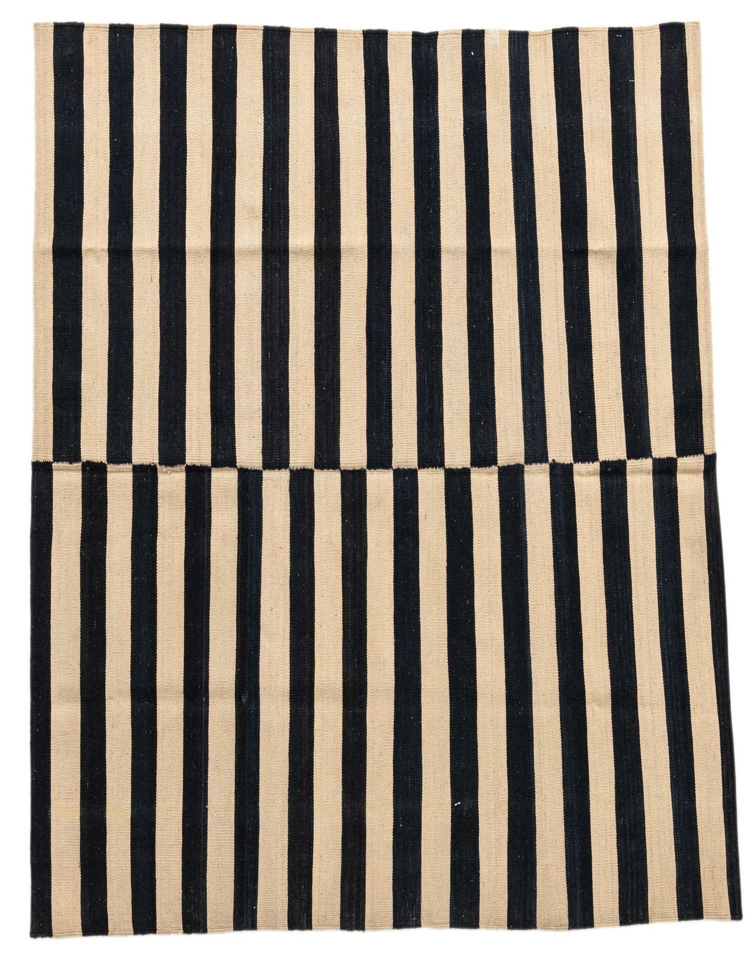 A 5' 3 x 5' 3 square black and ivory striped flatweave wool rug, featuring a modern tribal design.