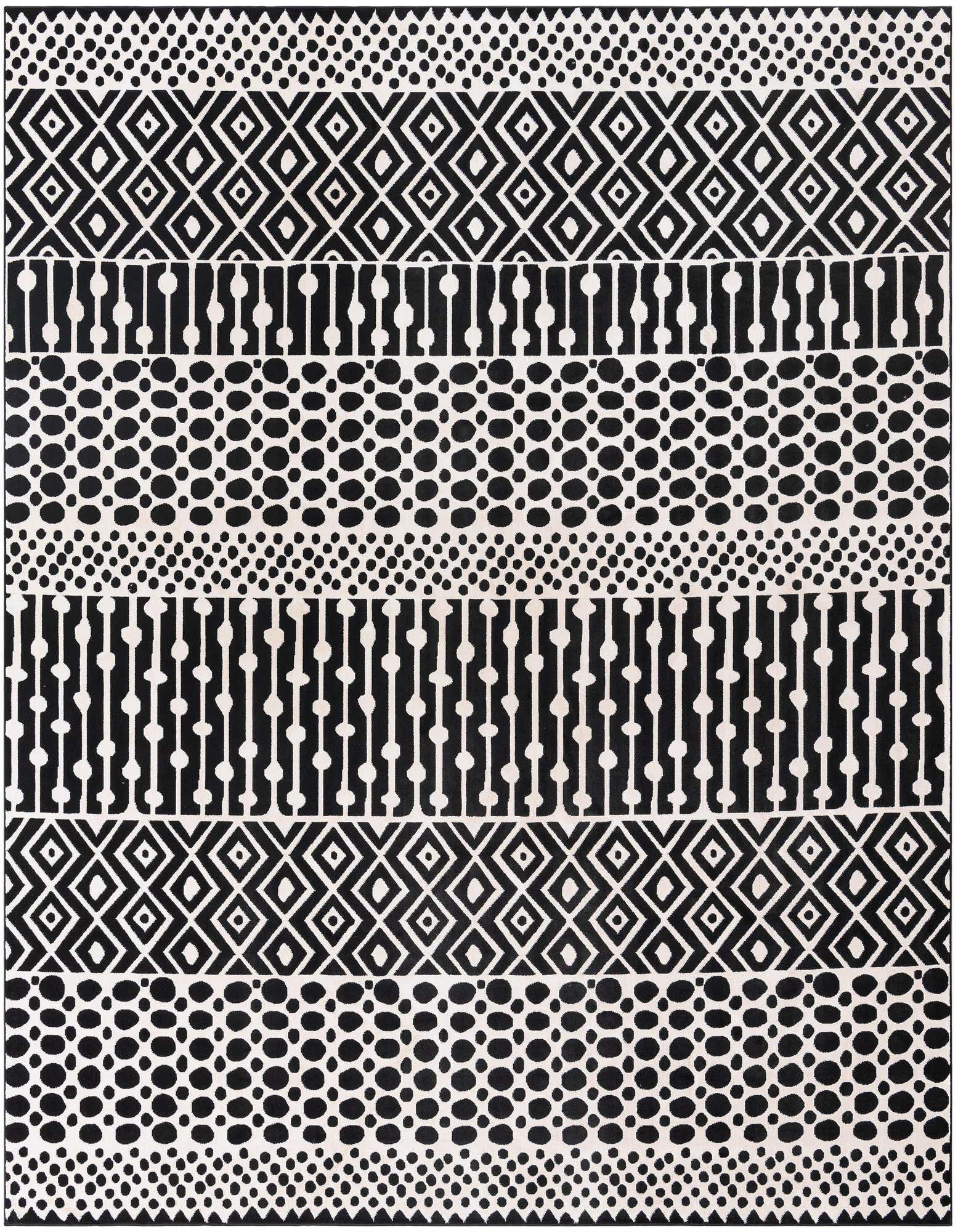 A square black and white rug featuring alternating bands of geometric diamonds, vertical lines with dots, and scattered oval shapes.