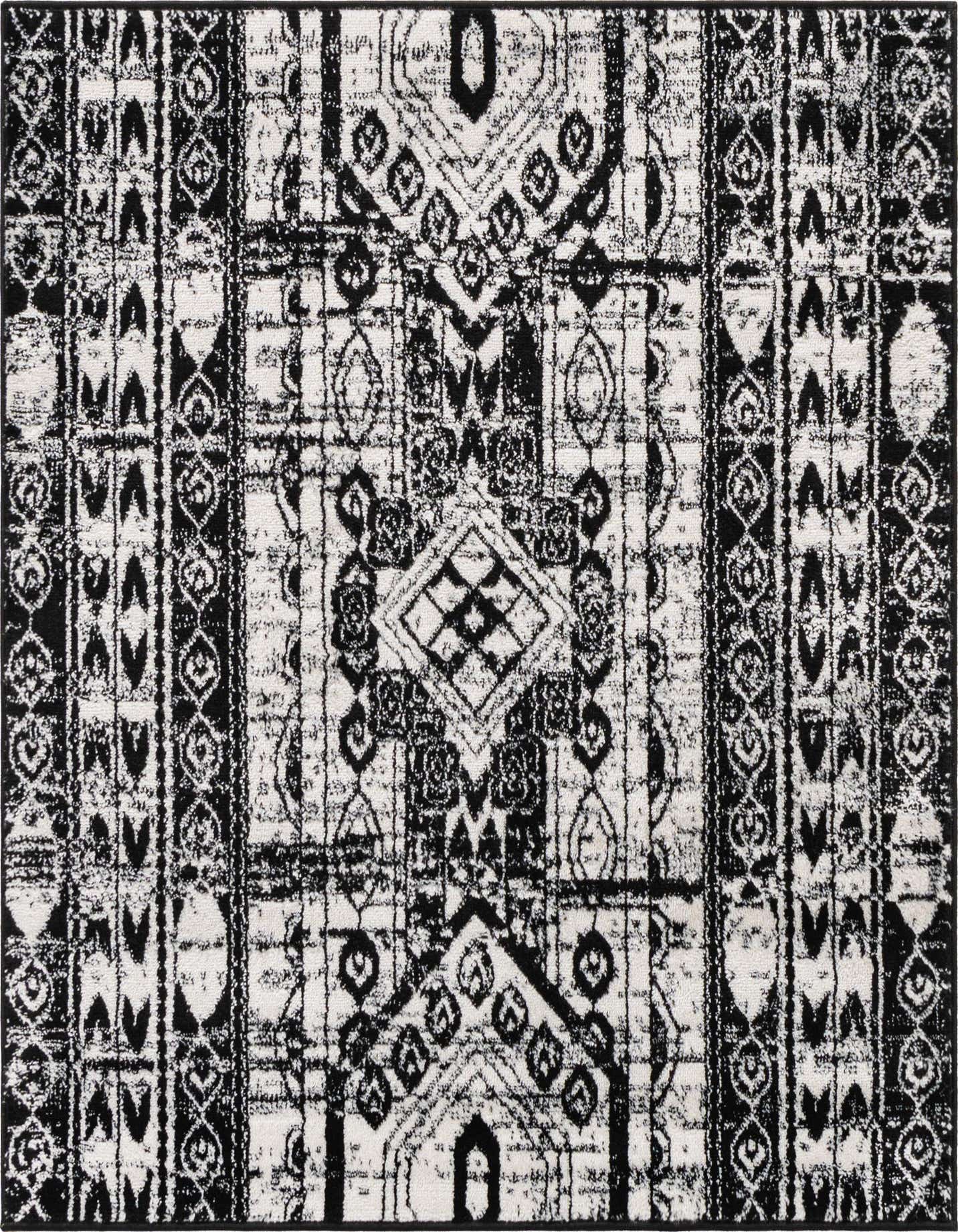 A 4'x4' square black and white Bohemian rug with tribal and Southwestern patterns, featuring a textured, high pile.