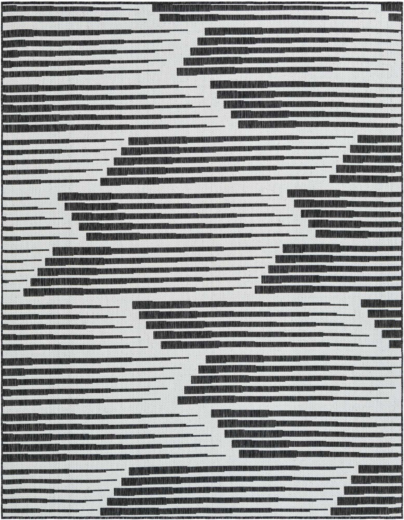 A 7' 10 x 7' 10 square black and white rug featuring a modern, abstract stripe pattern, suitable for a patio.