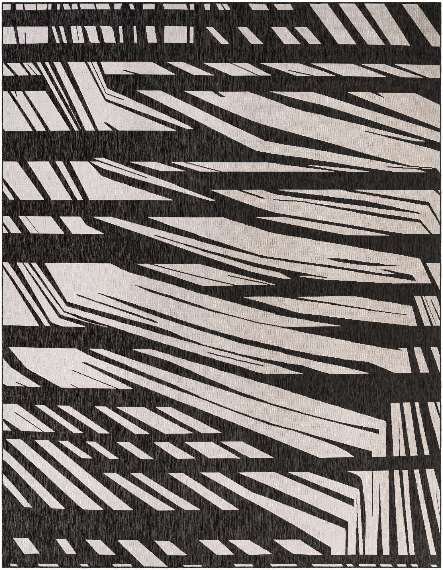 A 13' square modern abstract rug in black and ivory, featuring bold, angular stripes and geometric shapes.