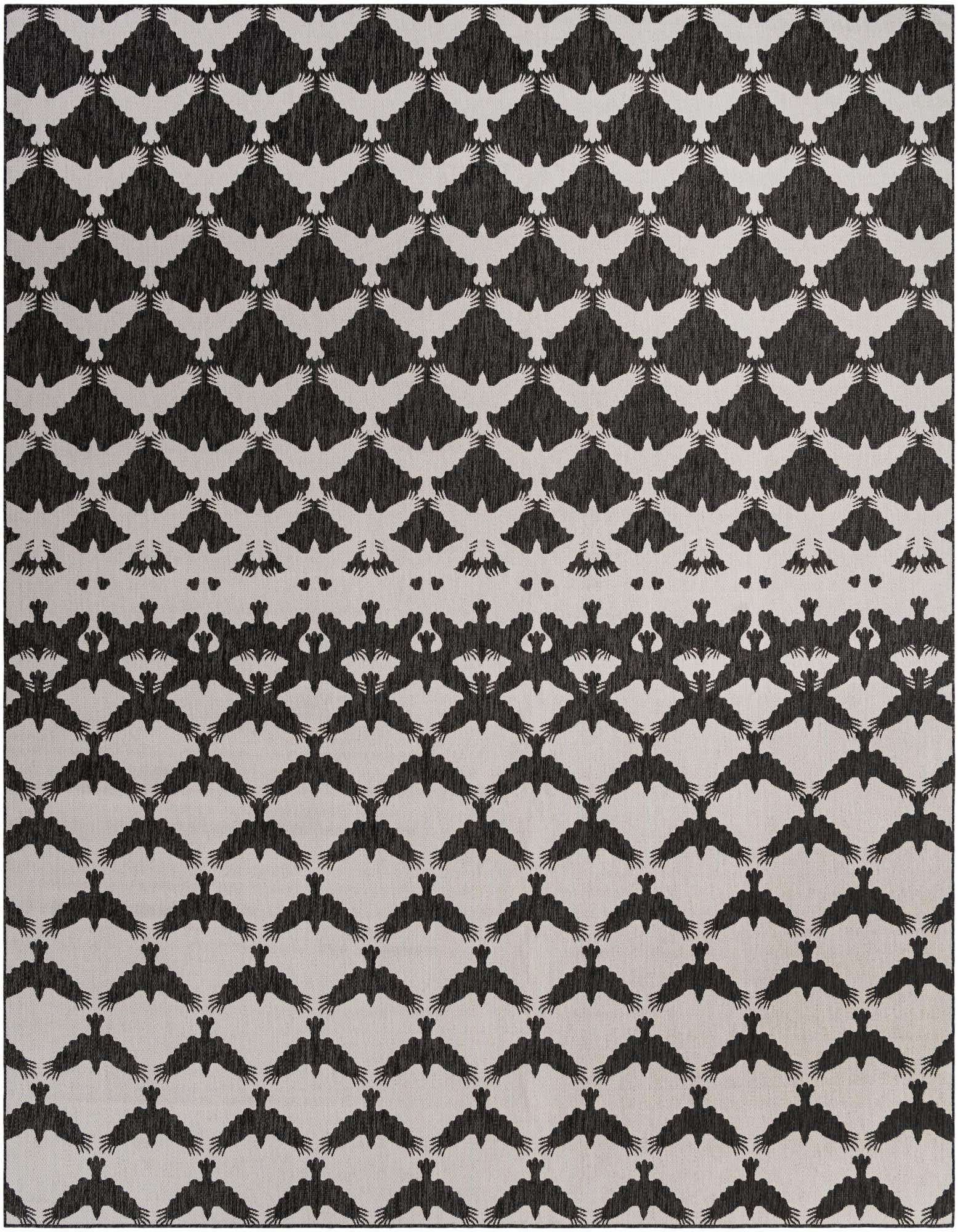 A 13' square modern black and white flatweave rug featuring a repeating pattern of stylized birds in flight.