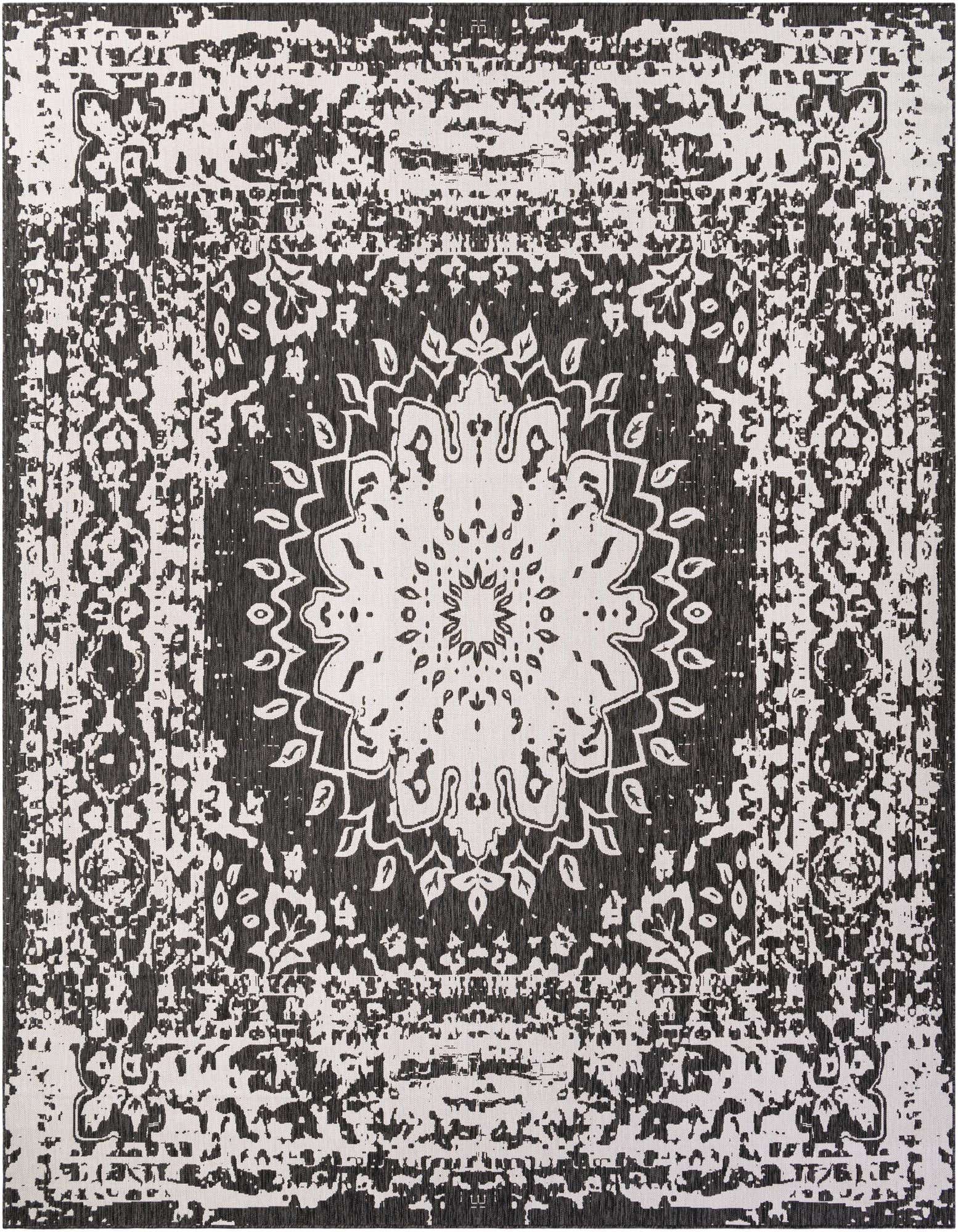 A 13' square black and white modern rug with a distressed medallion pattern, suitable for indoor or outdoor use.