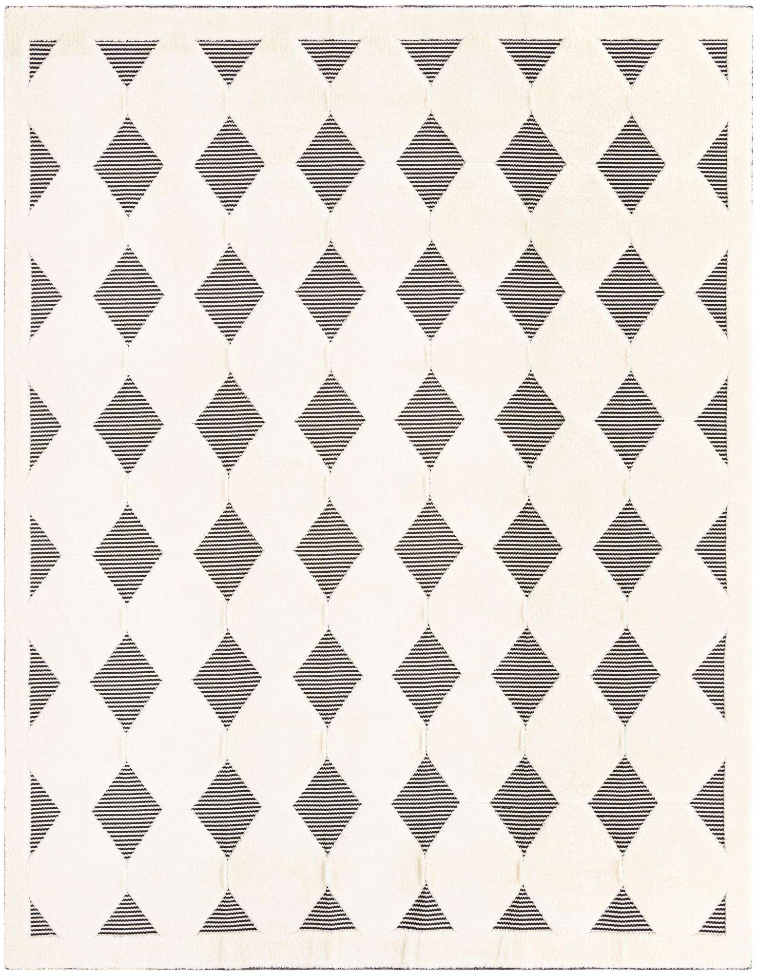 A 10'x10' square black and white rug featuring a repeating pattern of solid ivory diamonds alternating with striped black diamonds.