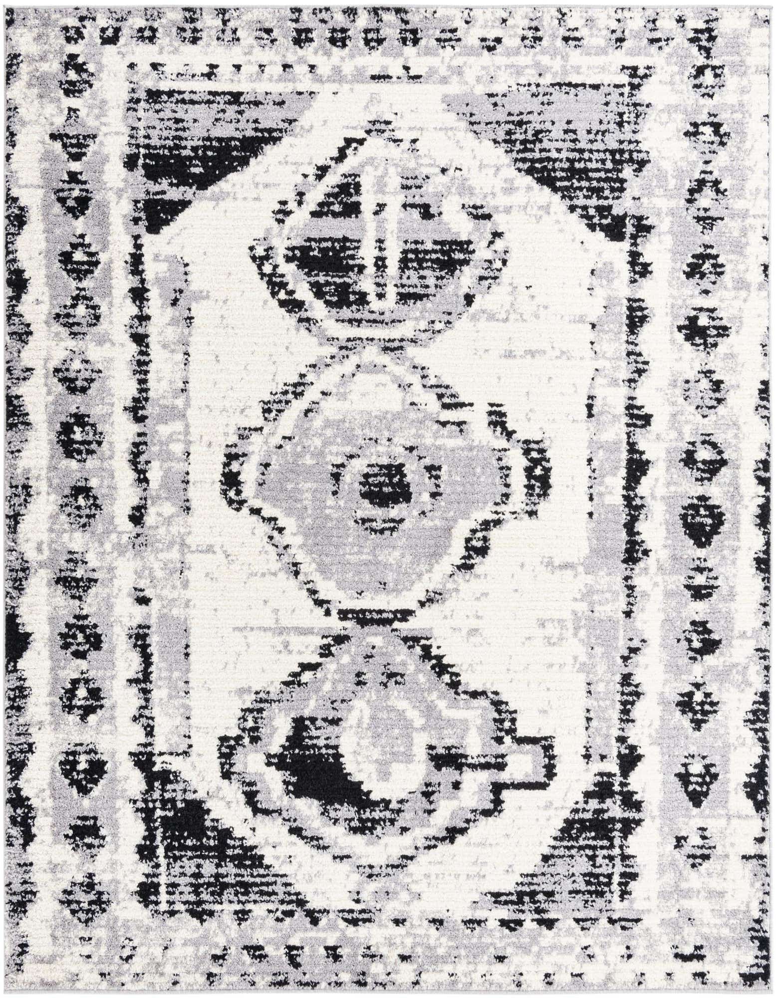 A square black, white, and gray Southwestern-style rug with a distressed tribal pattern, suitable for a living room.