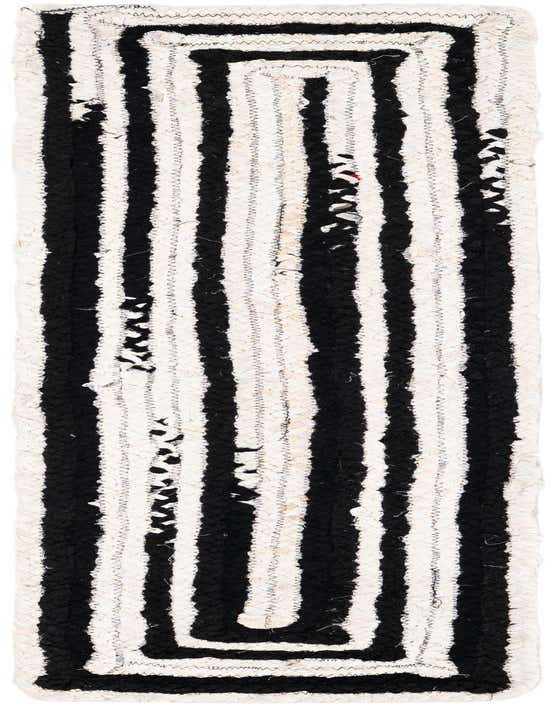 A 1' 2 x 5' 1 Braided Chindi runner rug in black and white, featuring thick vertical stripes and a rectangular border.