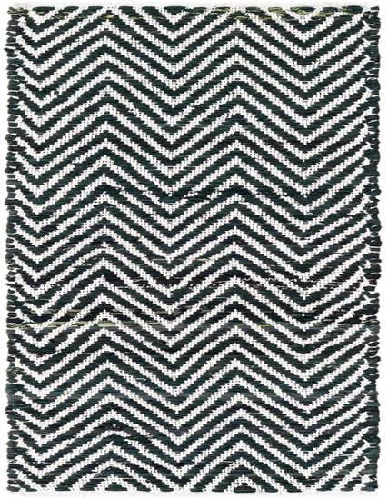 A black and white Chindi Chevron runner rug, 1' 2 x 6' 1, featuring a bold zigzag pattern, ideal for a hallway or kitchen.