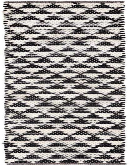 A 1' 2 x 6' 1 black and white runner rug with a repeating geometric pattern, perfect for a hallway or kitchen.
