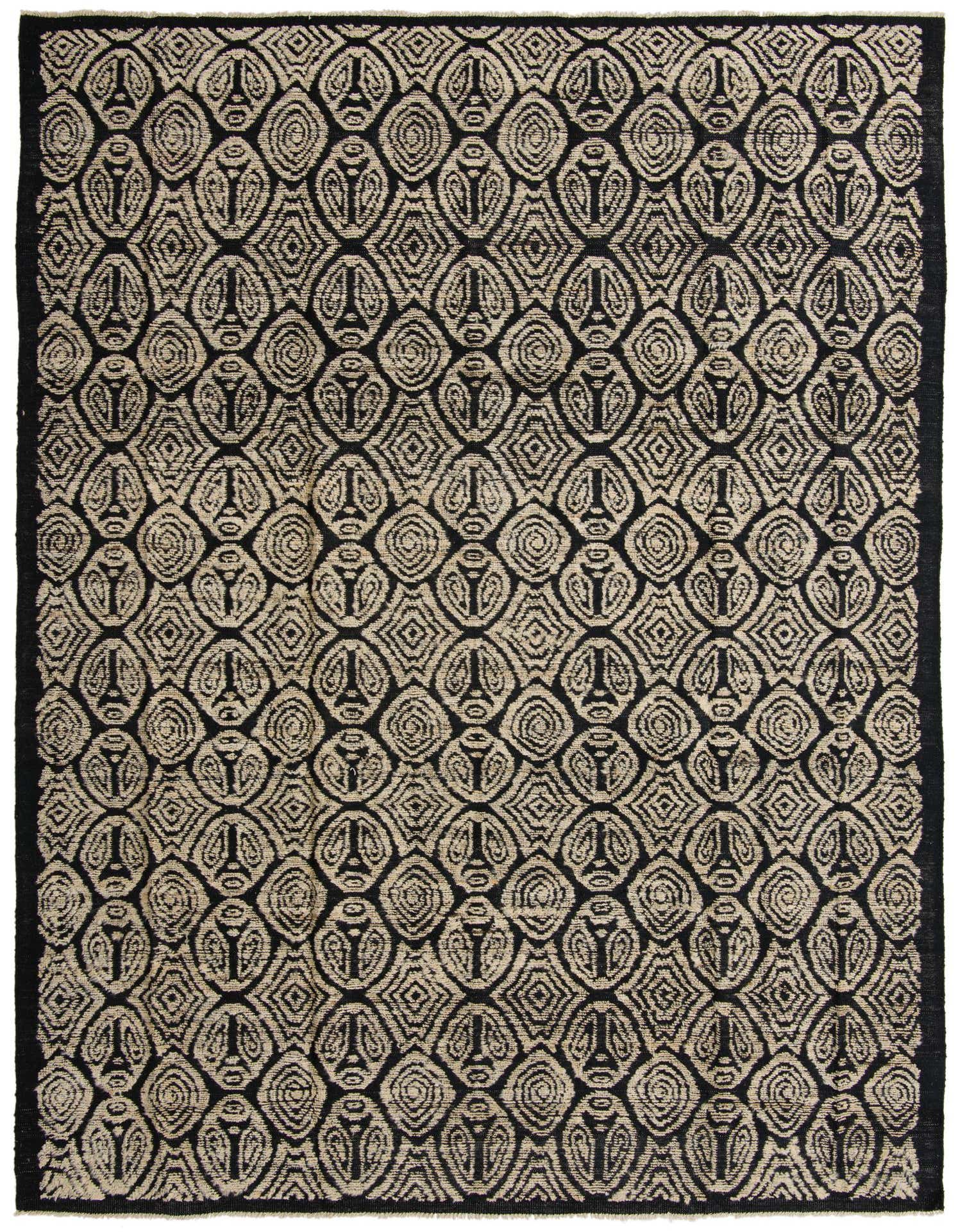 A rectangular 9x12 Darya rug featuring a modern abstract pattern in brown and tan tones, with a textured wool pile.