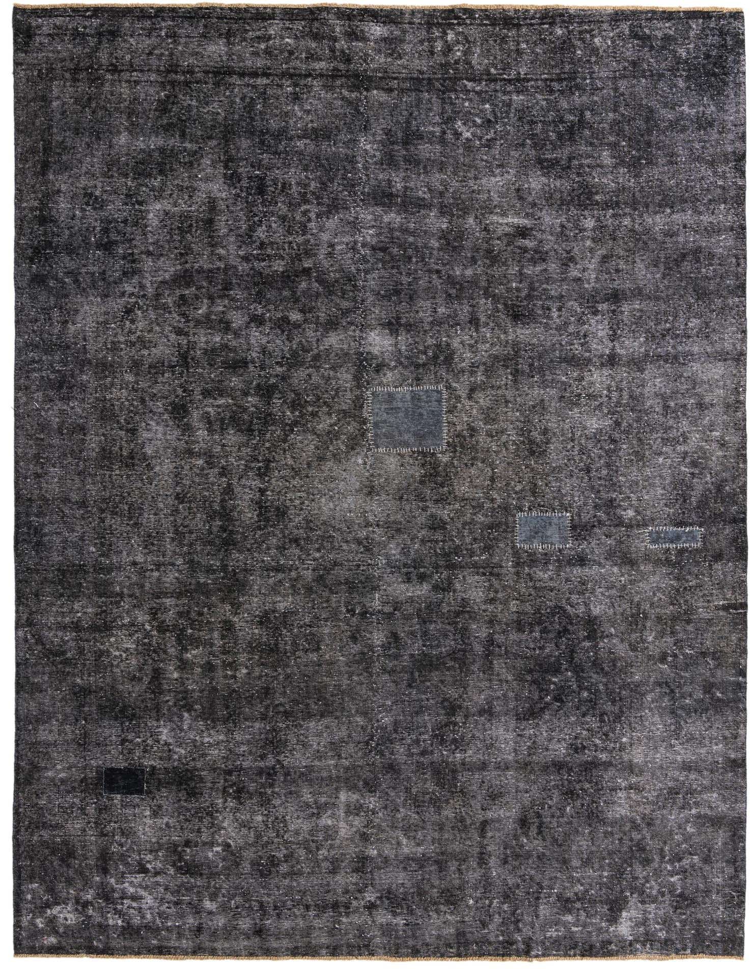 A 9x12 rectangular Ultra Vintage rug in black and gray, featuring a distressed Persian-inspired pattern with subtle abstract patches.