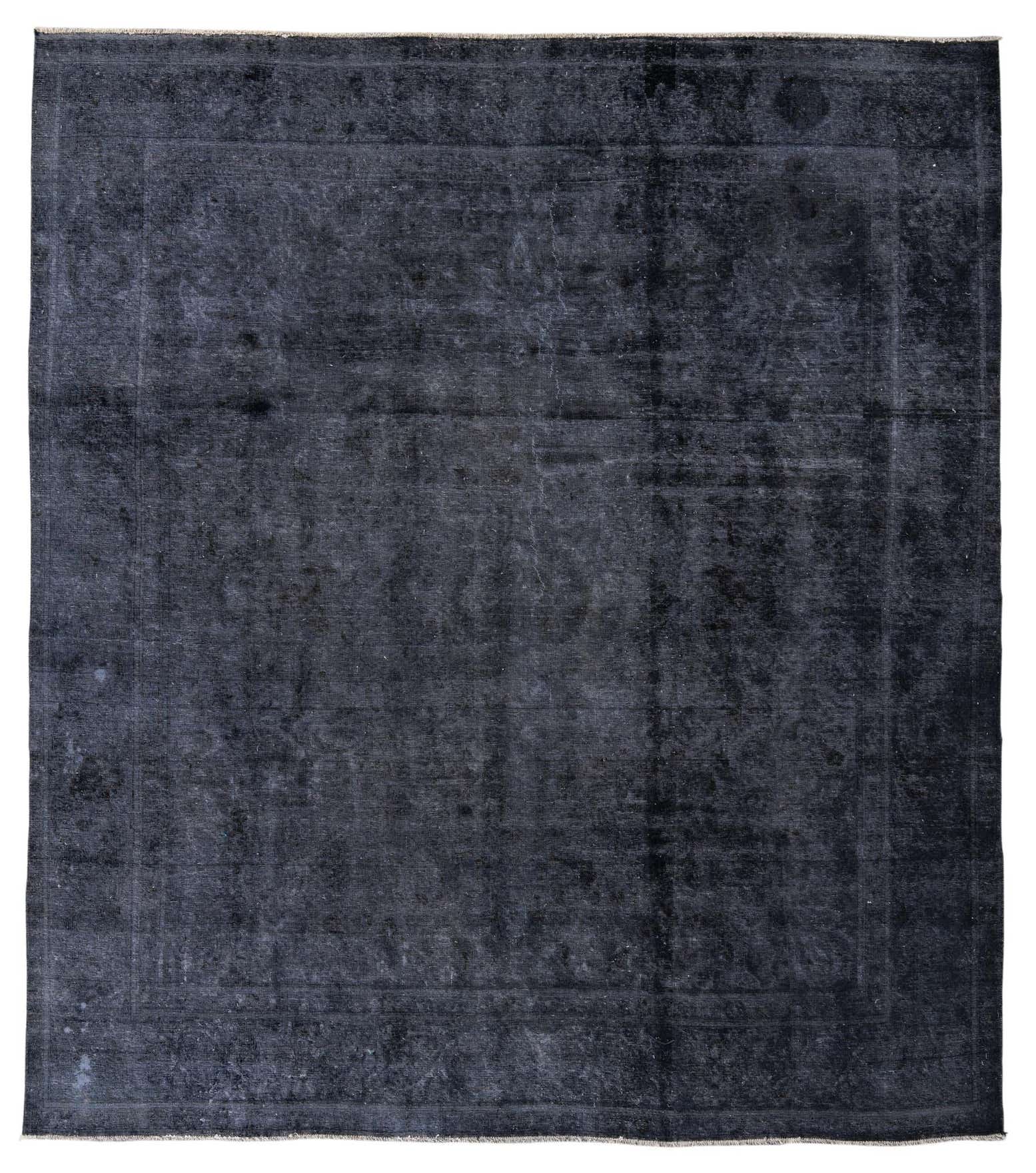 A 9x12 rectangular black and gray vintage Persian wool rug with a subtle distressed pattern, ideal for a living room.
