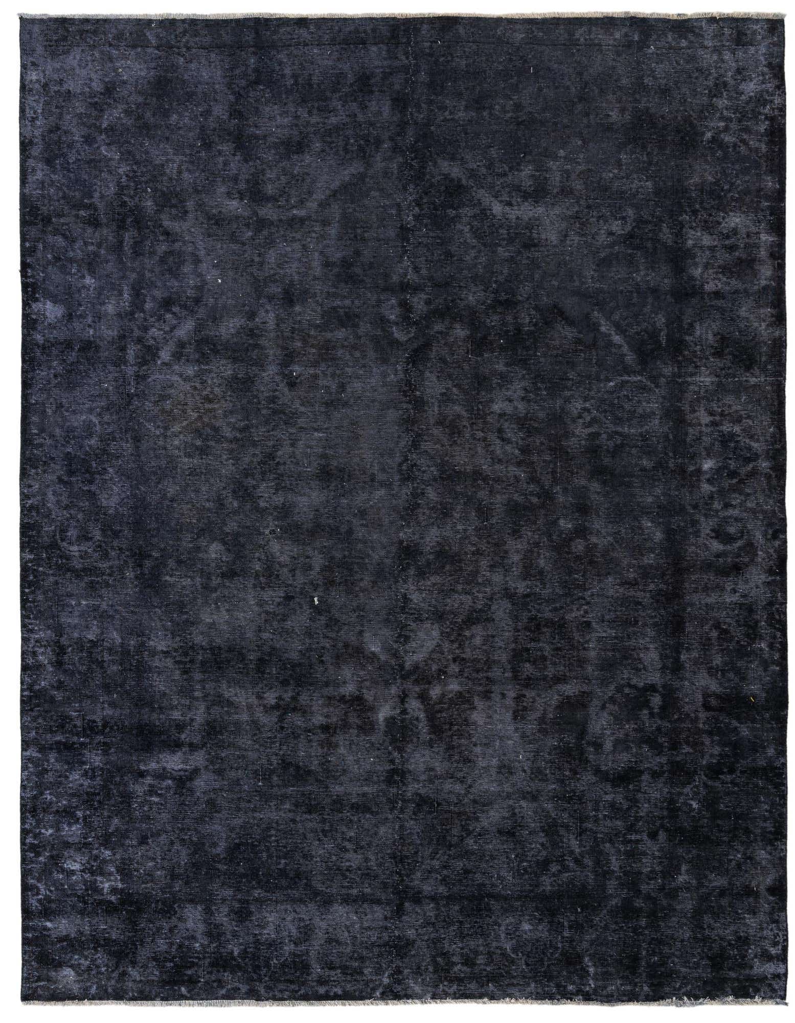 A large 9x12 rectangular Ultra Vintage rug in deep black and gray tones, featuring a subtle distressed Persian pattern.