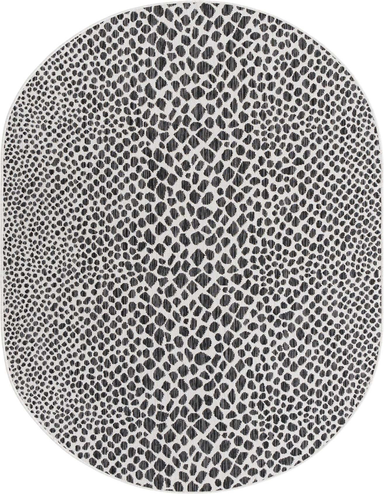 A 5'3" x 8'0" oval black and white modern rug with a zebra-like abstract pattern, suitable for indoor or outdoor use.