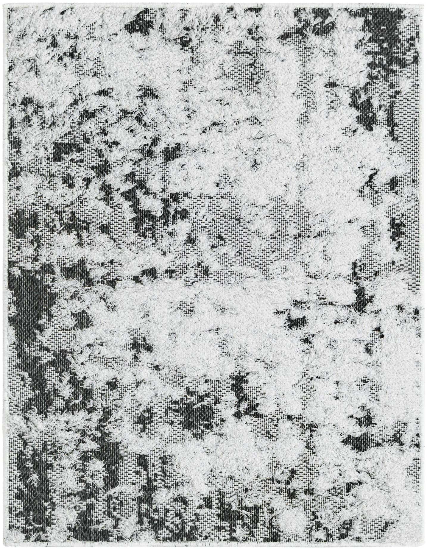 A 2x3 rectangular Rugs.com Abbey rug featuring an abstract black and white pattern with a textured, high pile.