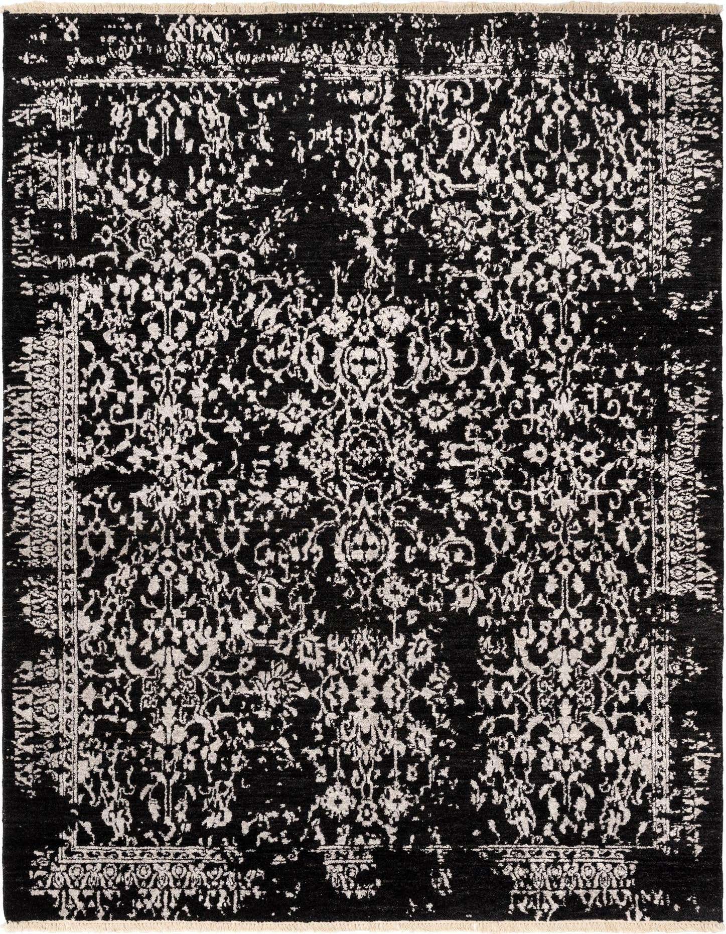 A 4x6 rectangular black wool Persian rug with an intricate distressed white floral pattern and border.