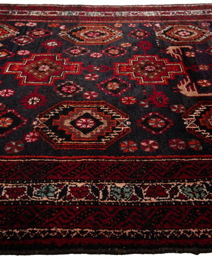 Detail image of  4' 1 x 6' 10  Hand Knotted Balouch Wool Rug