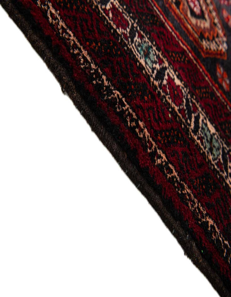 Detail image of  4' 1 x 6' 10  Hand Knotted Balouch Wool Rug