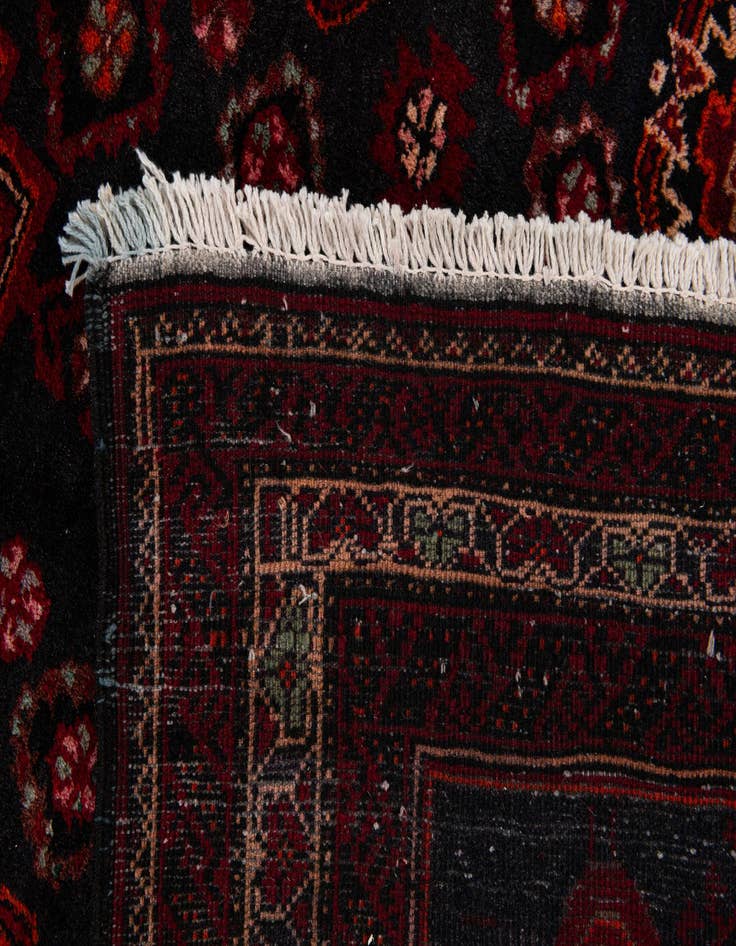 Detail image of  4' 1 x 6' 10  Hand Knotted Balouch Wool Rug