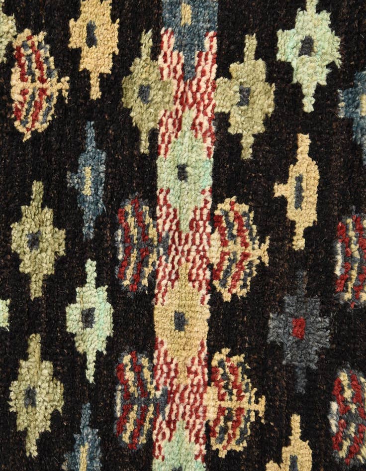 Detail image of  4' 1 x 6' 2  Hand Knotted Balouch Wool Rug