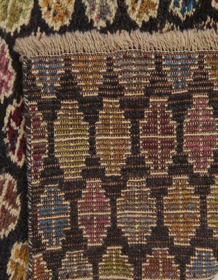 Detail image of  5' x 8' 1  Hand Knotted Balouch Wool Rug