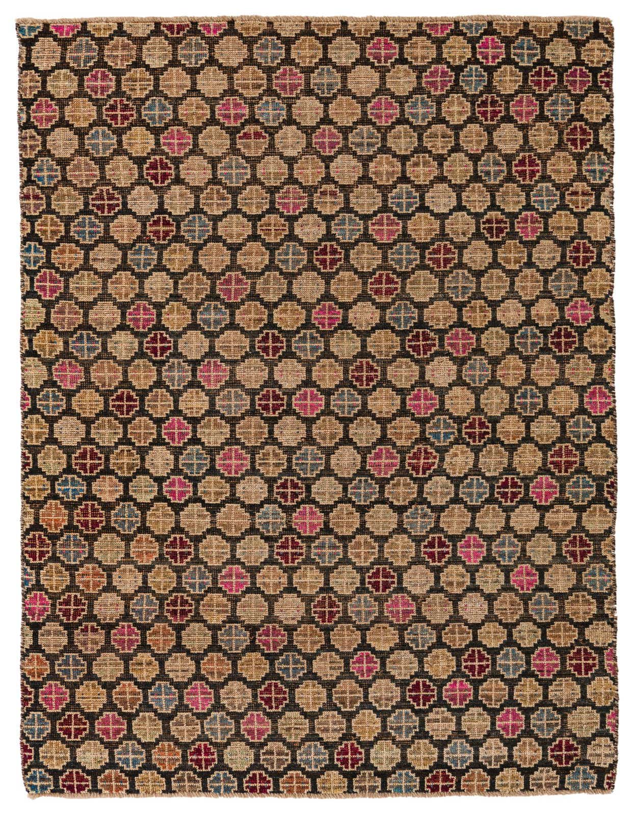 A rectangular 5x8 Balouch rug with a tribal, modern, abstract pattern in black, tan, pink, blue, and brown.