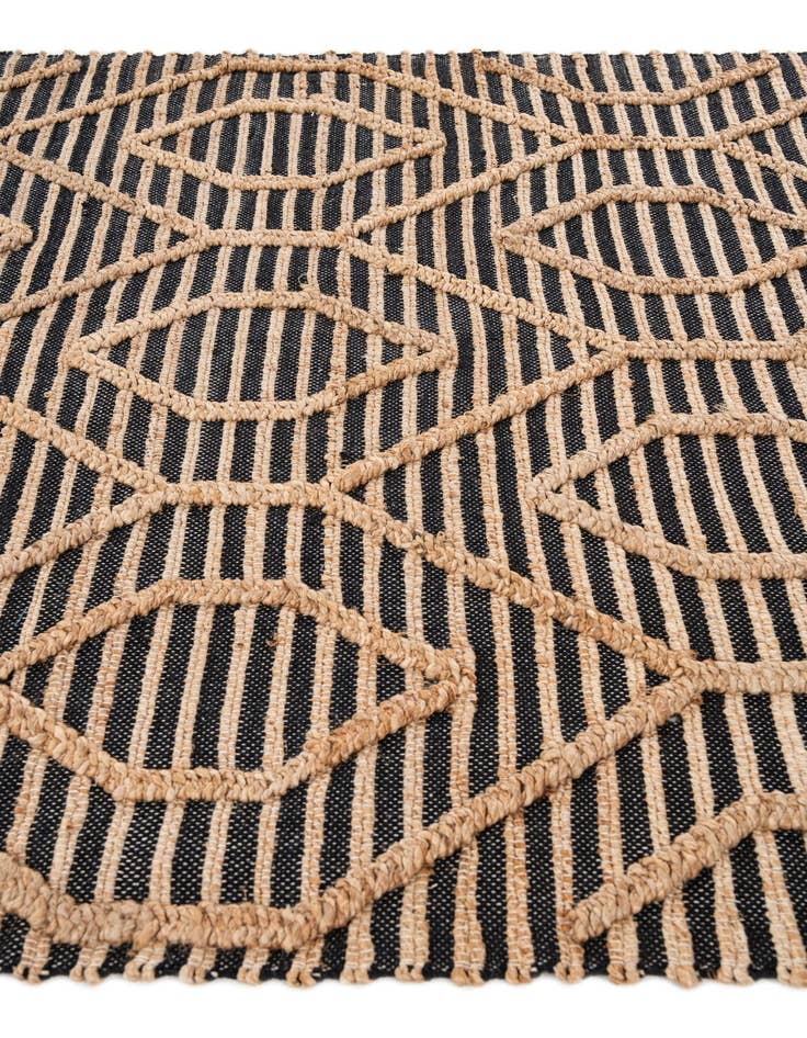 Detail image of  5' x 7' 6  Hand Braided Jute Rug