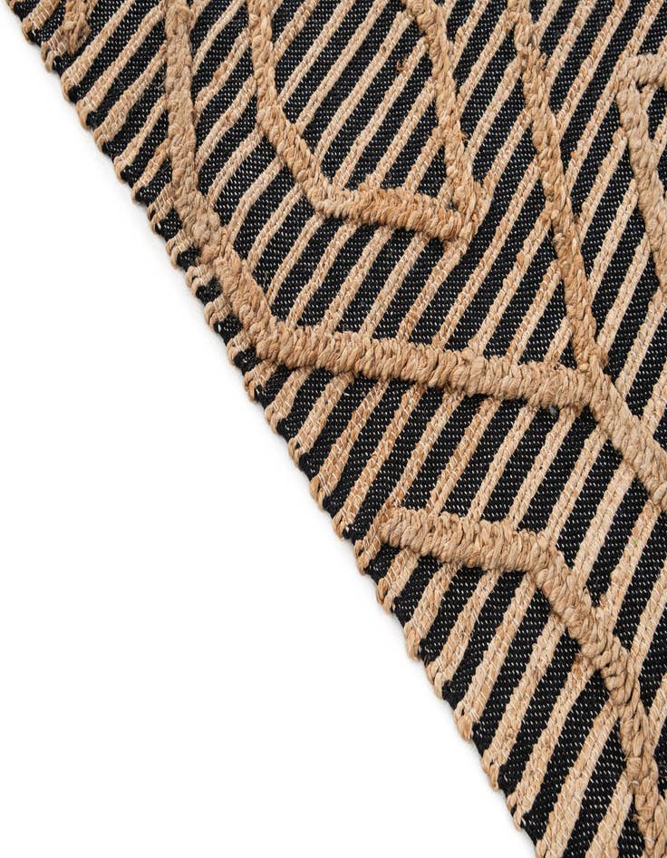 Detail image of  5' x 7' 6  Hand Braided Jute Rug