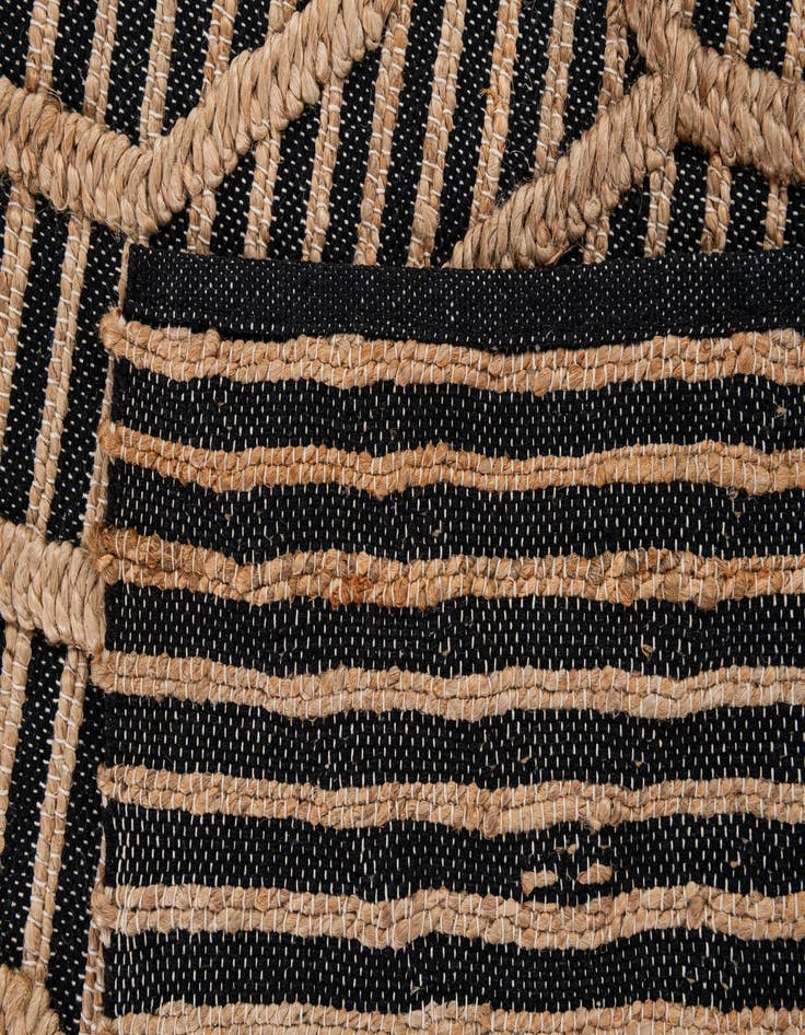 Detail image of  5' x 7' 6  Hand Braided Jute Rug