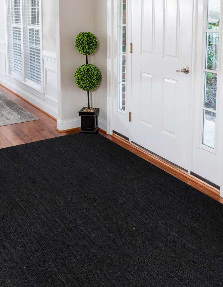 Black 4' 1 x 6' 1 Hand Braided Jute Rug | Rugs.com