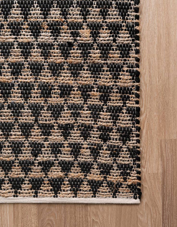 Detail image of  4' 1 x 6' 1  Hand Woven Chindi Jute Rug