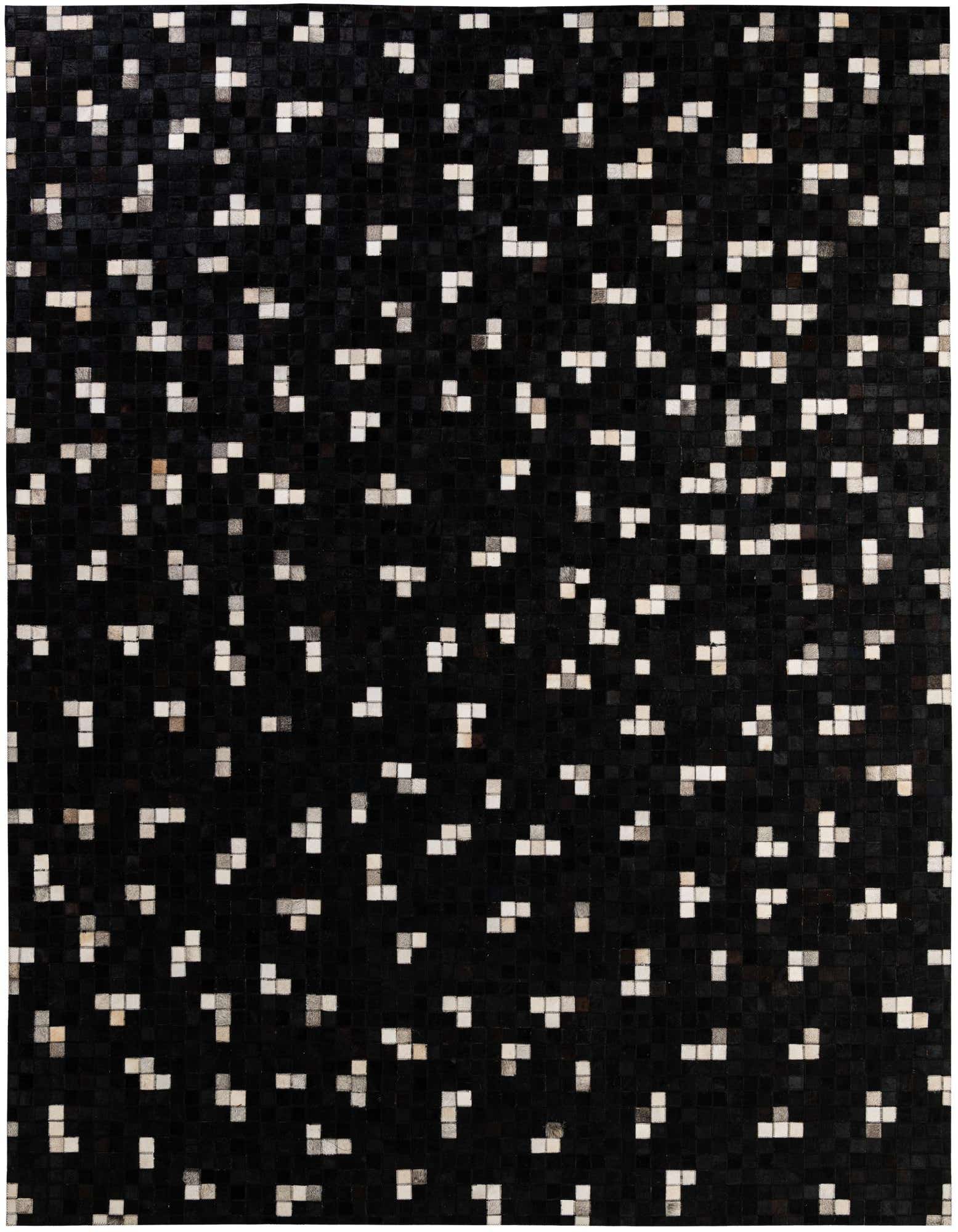 A rectangular 8x11 black cowhide rug with a modern patchwork pattern of scattered white and gray geometric shapes.