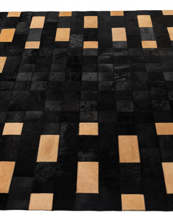 Detail image of  5' 1 x 7' 11 Cowhide - Patchwork Rug