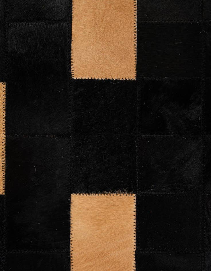 Detail image of  5' 1 x 7' 11 Cowhide - Patchwork Rug