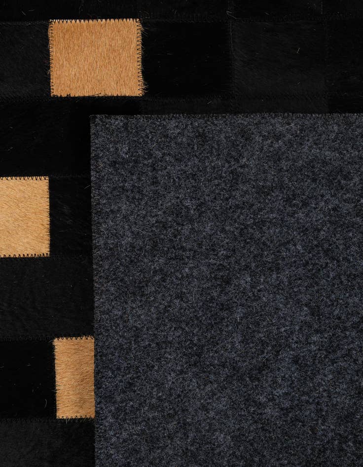 Detail image of  5' 1 x 7' 11 Cowhide - Patchwork Rug