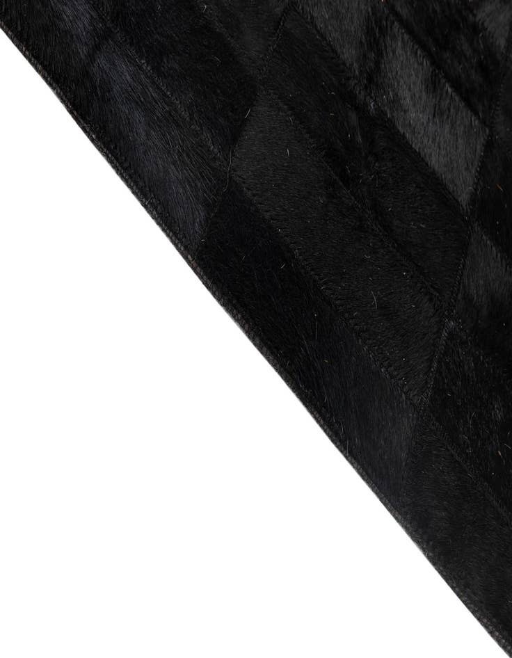 Detail image of  5' 1 x 8' 1 Cowhide - Patchwork Rug