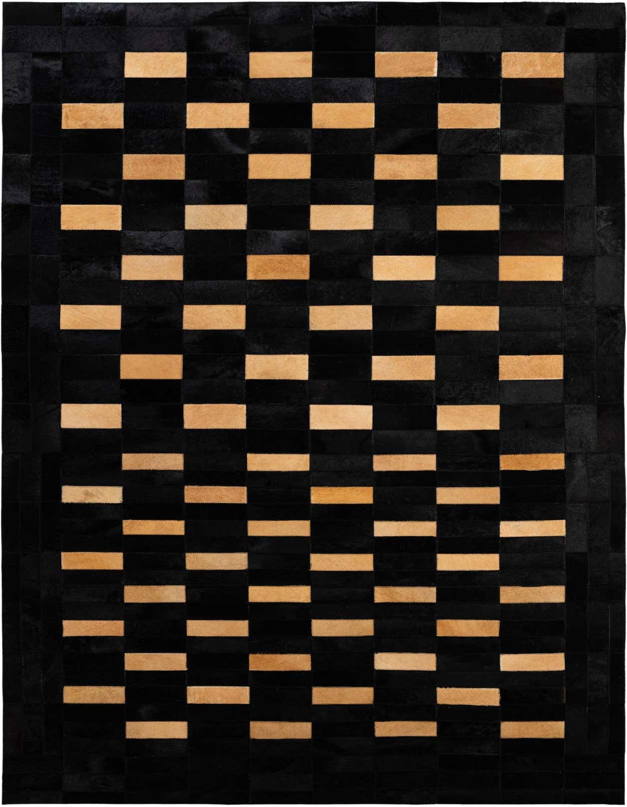 A 5x8 rectangular black and tan modern patchwork cowhide rug, handmade with a medium pile.