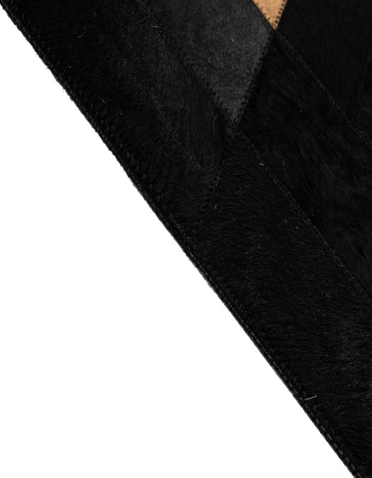 Detail image of  5' 1 x 7' 11 Cowhide - Patchwork Rug